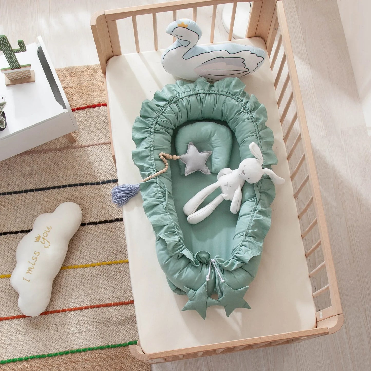 Réducteur de Lit bébé | Minty™